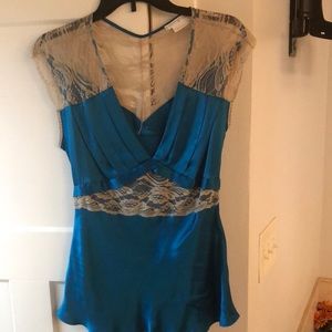 Silk, deep turquoise blouse.